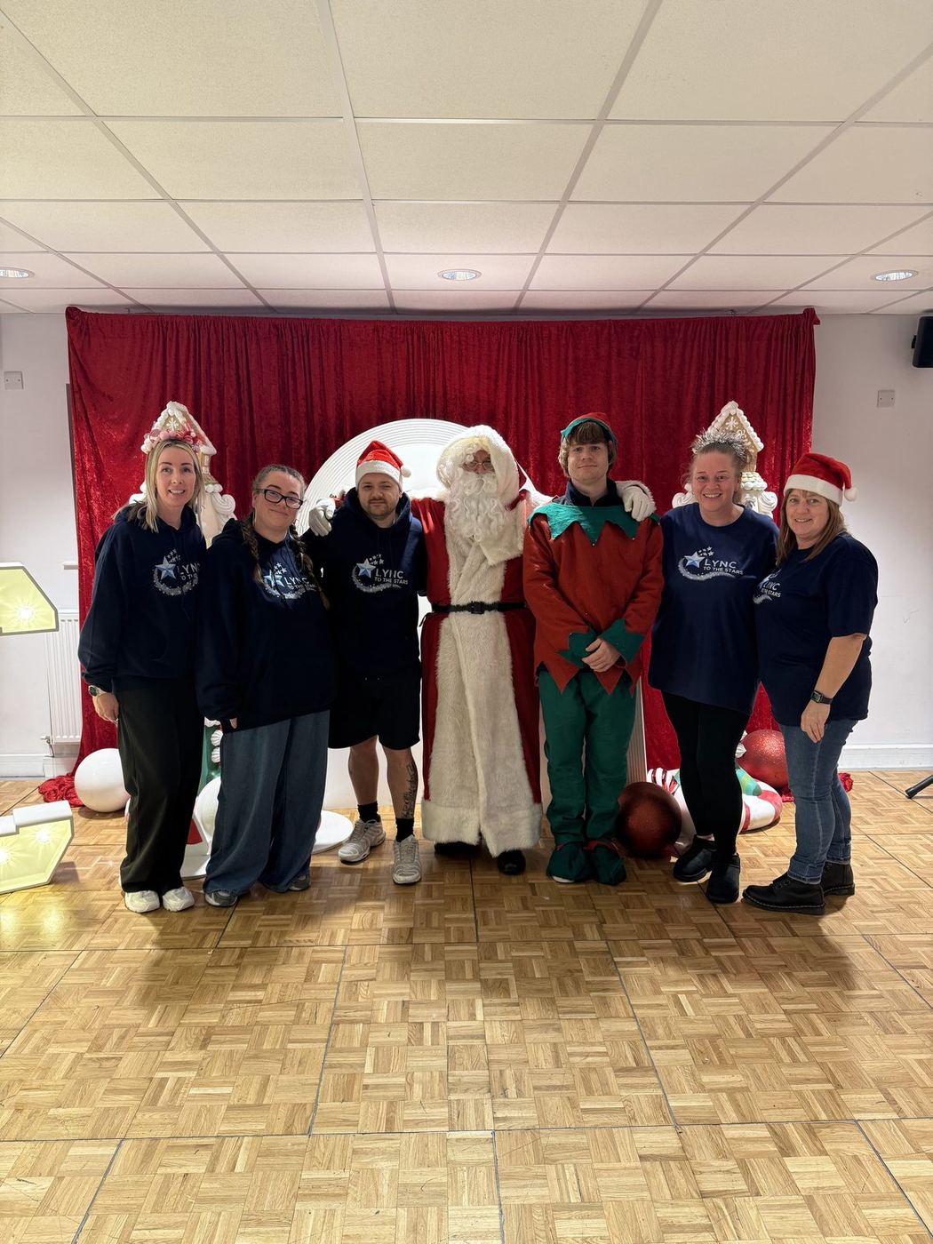 The team and Santa together at the end of the day