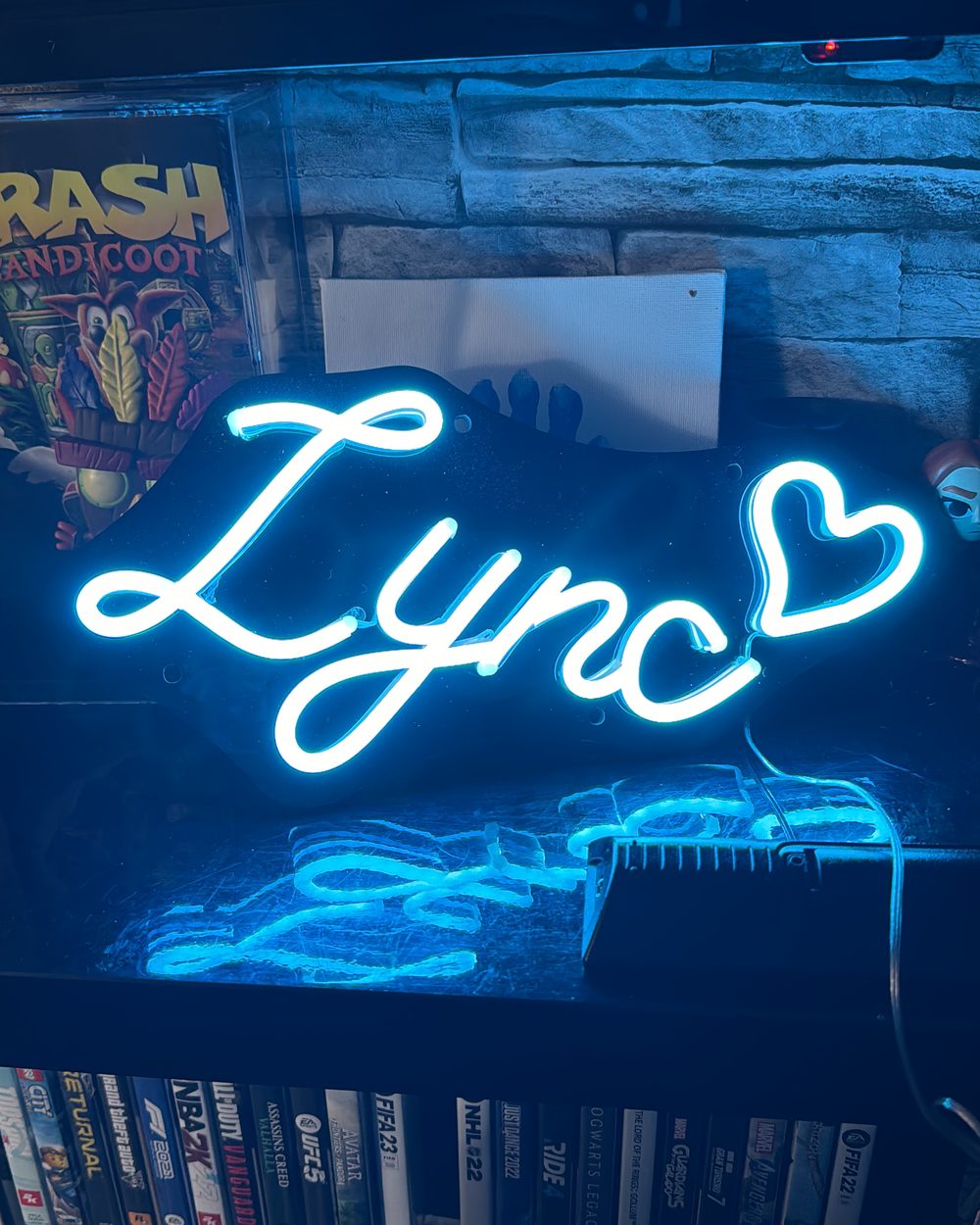 Lync’s name in glowing blue neon