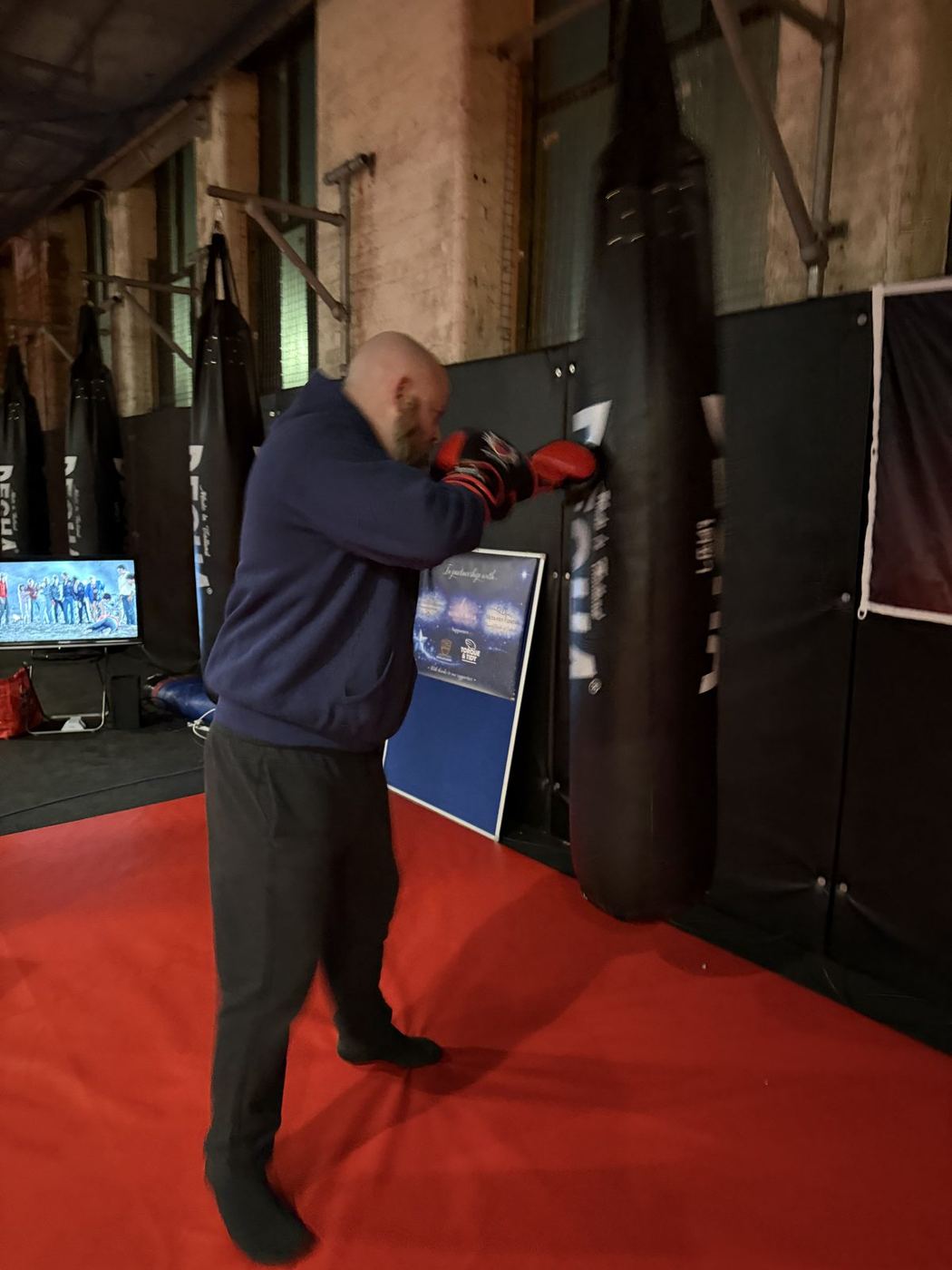 Lee on the punch bag during the challenge