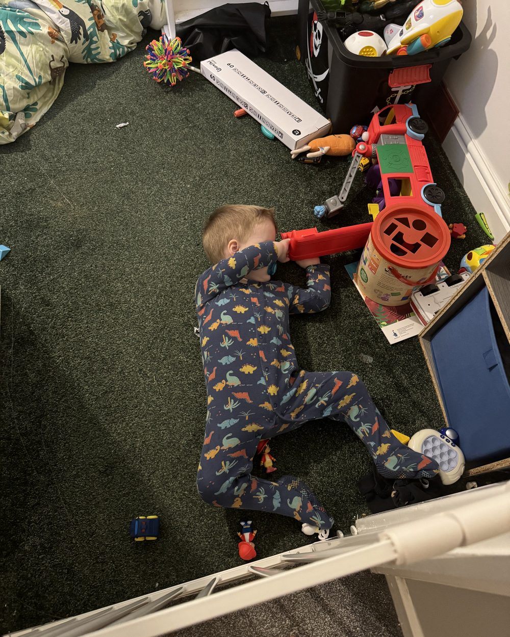 Lync playing with his toys