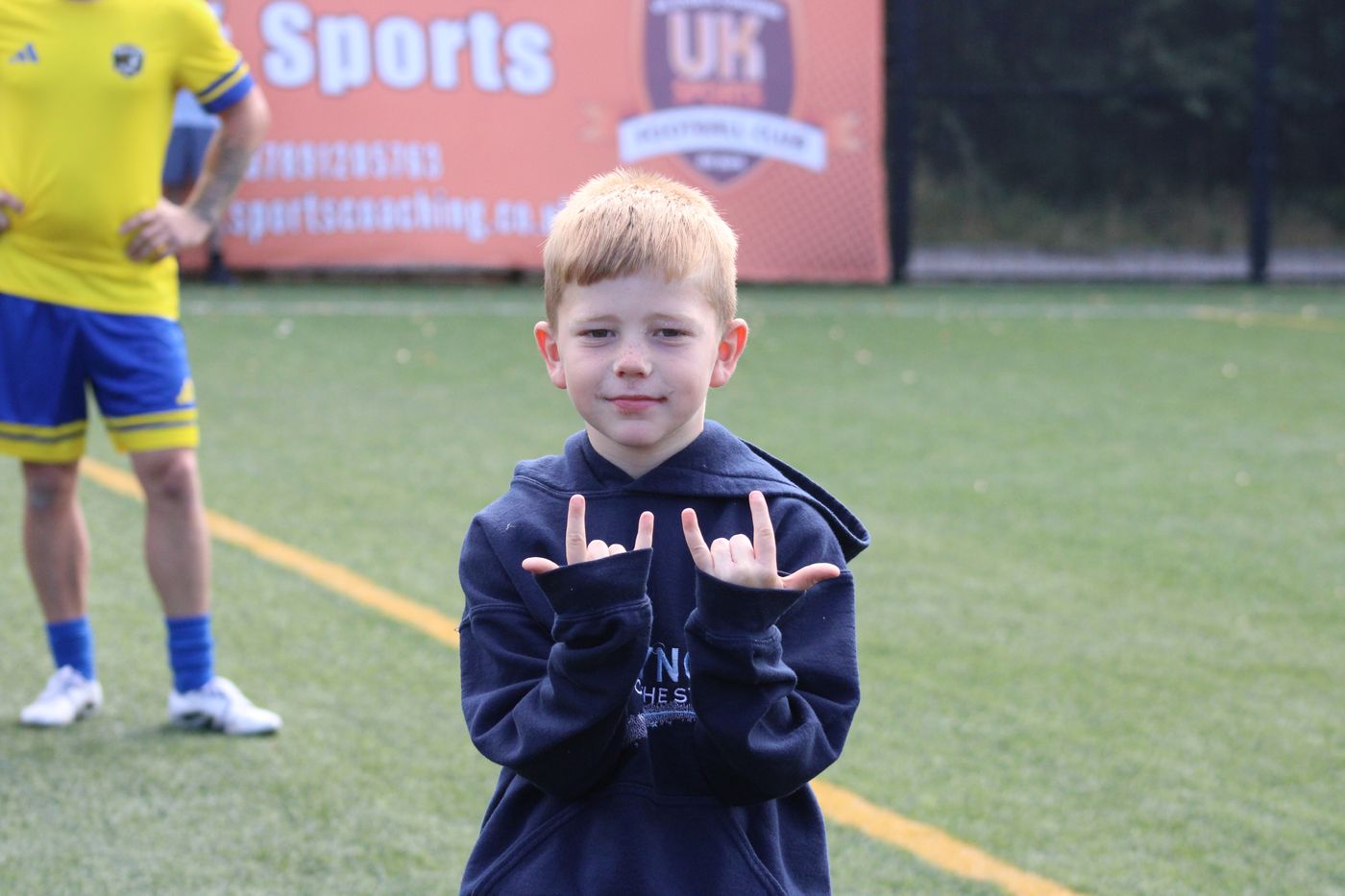 A young supporter in his Lync to the Stars hoodie
