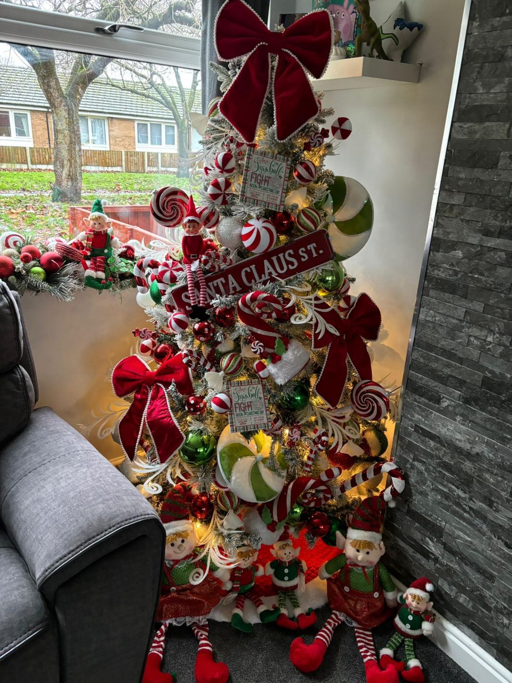 Natalie's Christmas tree, decorated in red with little elves