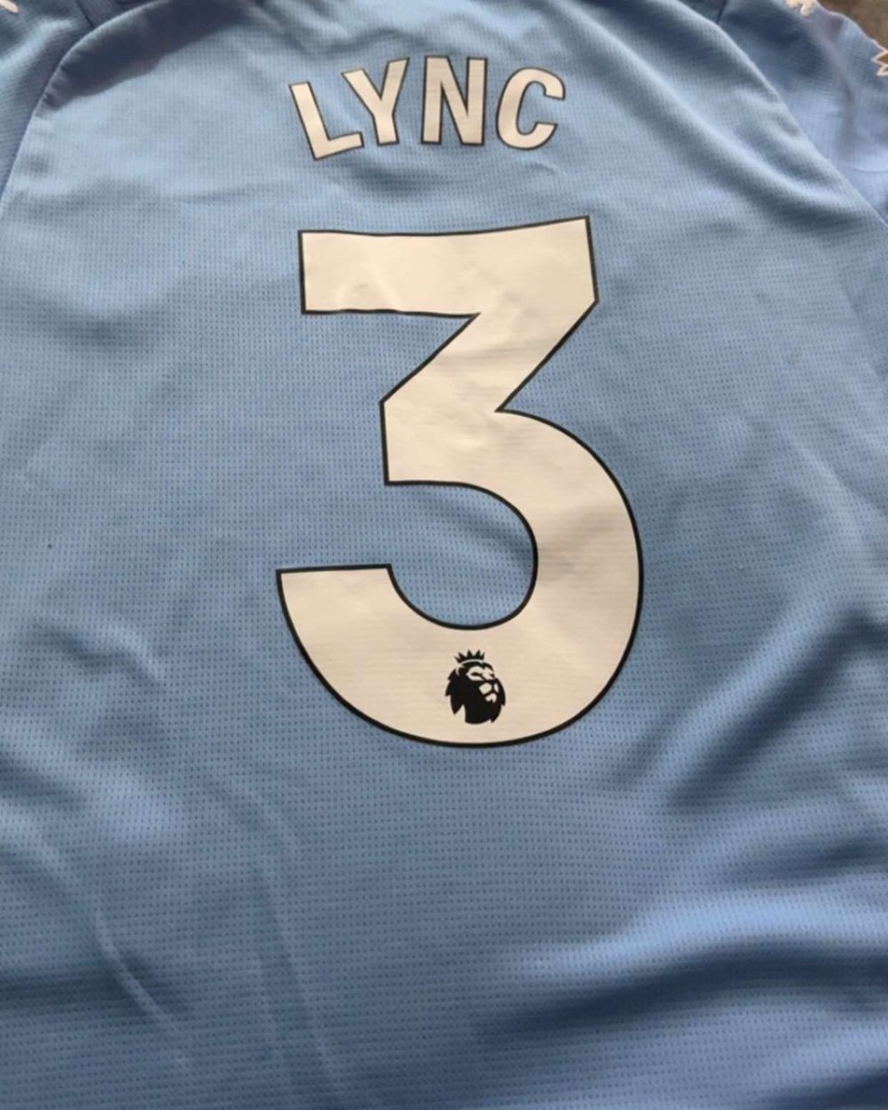A football shirt with LYNC and the number 3 on the back